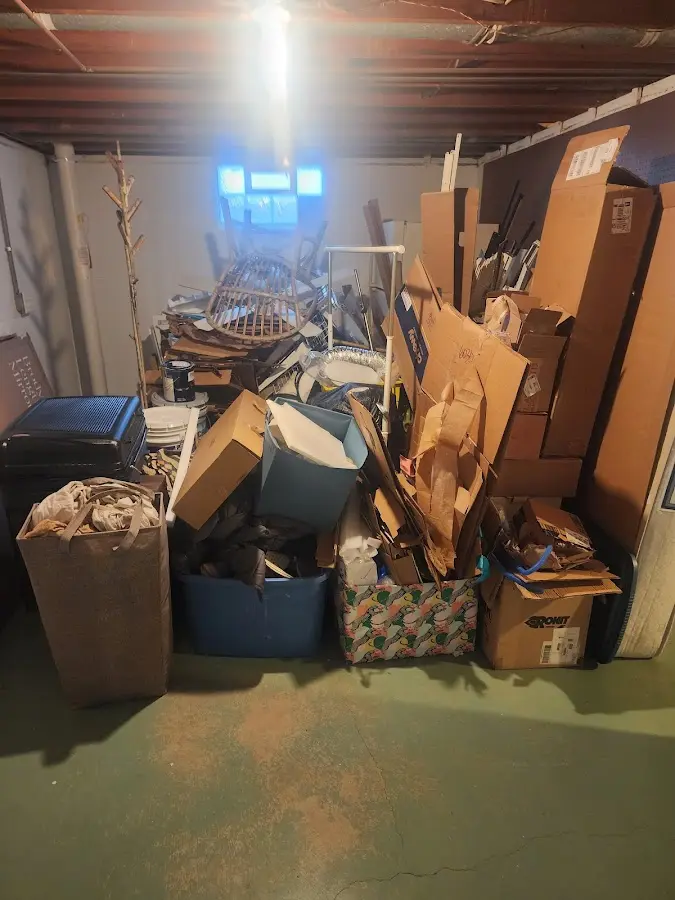 Roll-off dumpster container at job site for Concrete Dumpster Rental in Highland Park